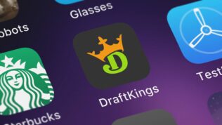 The DraftKings app icon on an iPhone