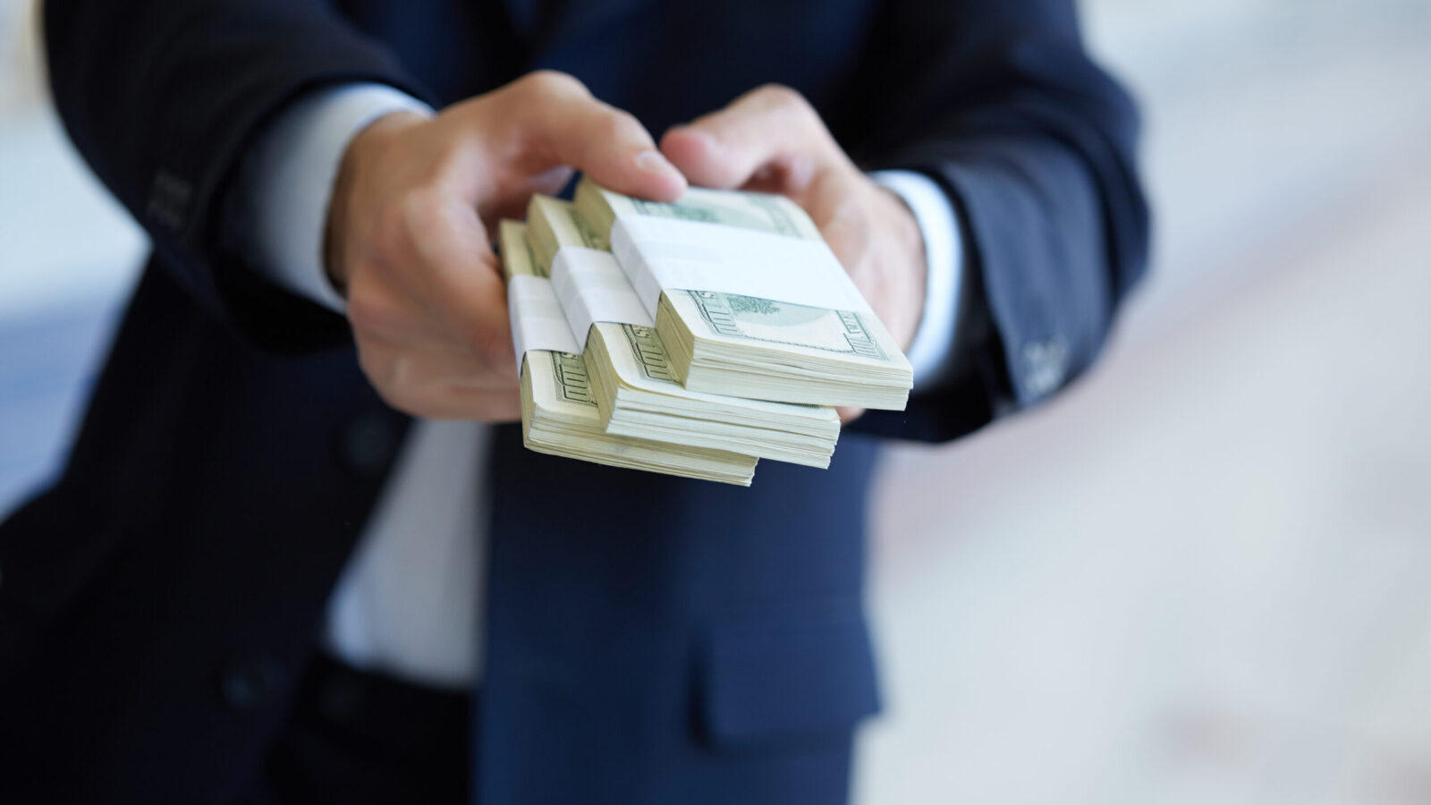 handing over money