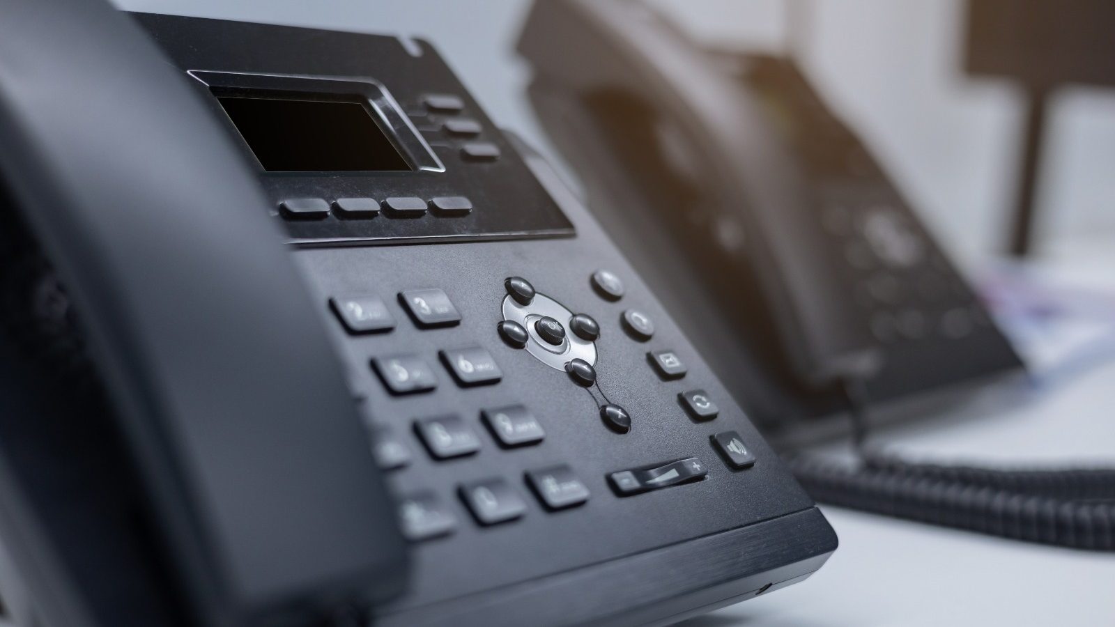 black-multi-line-telephone