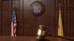 new-jersey-courtroom-gavel-flags